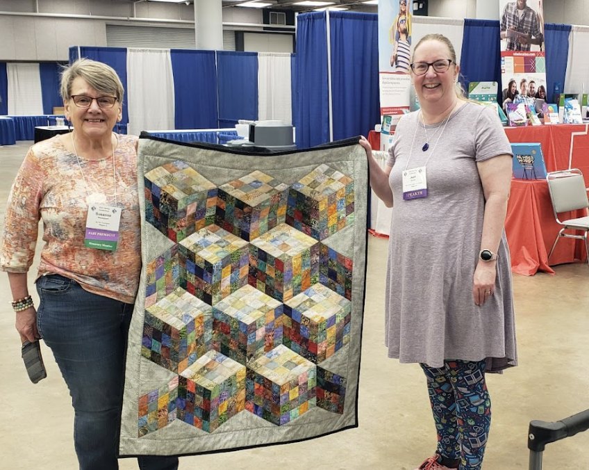 Jean Michael won the Quilt Raffle. Jean is on the right.